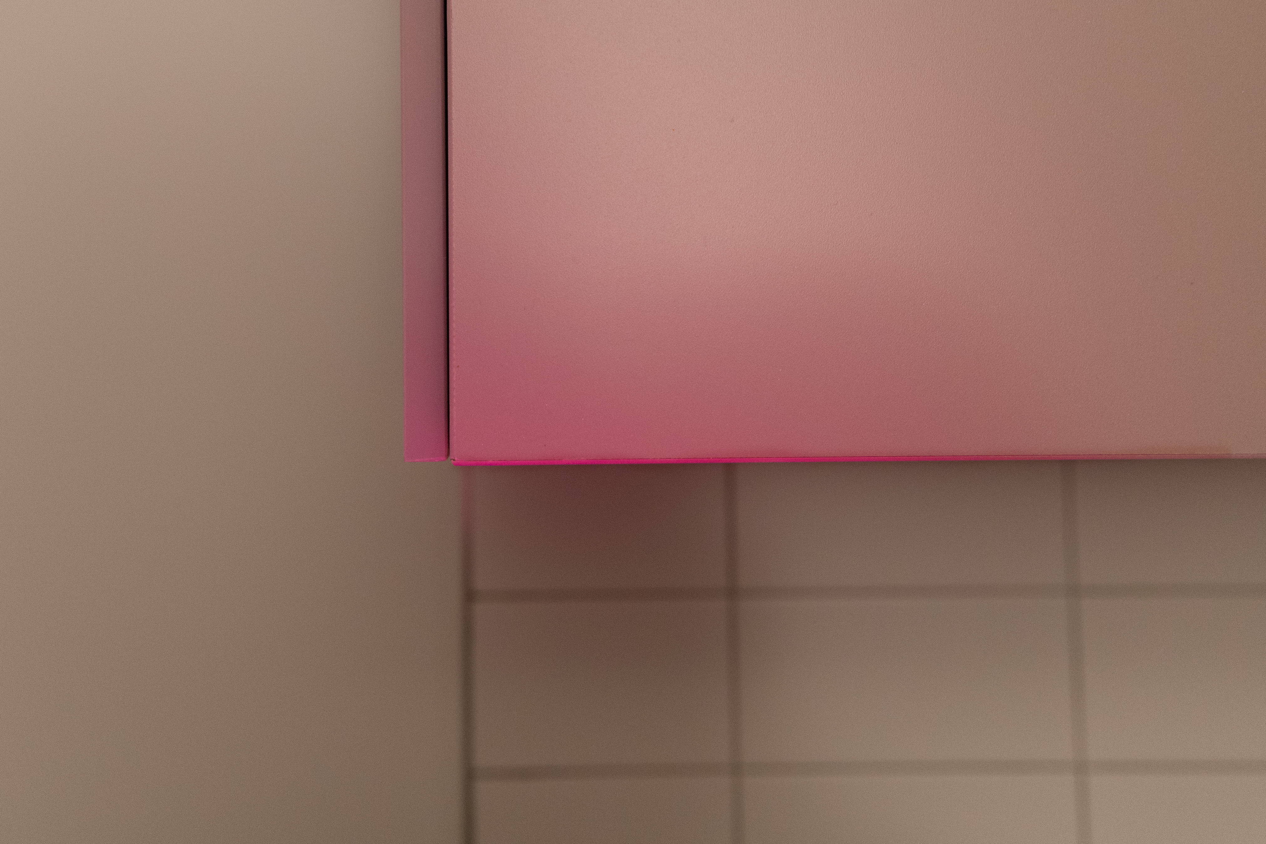Interior corner with red and brown colored light
