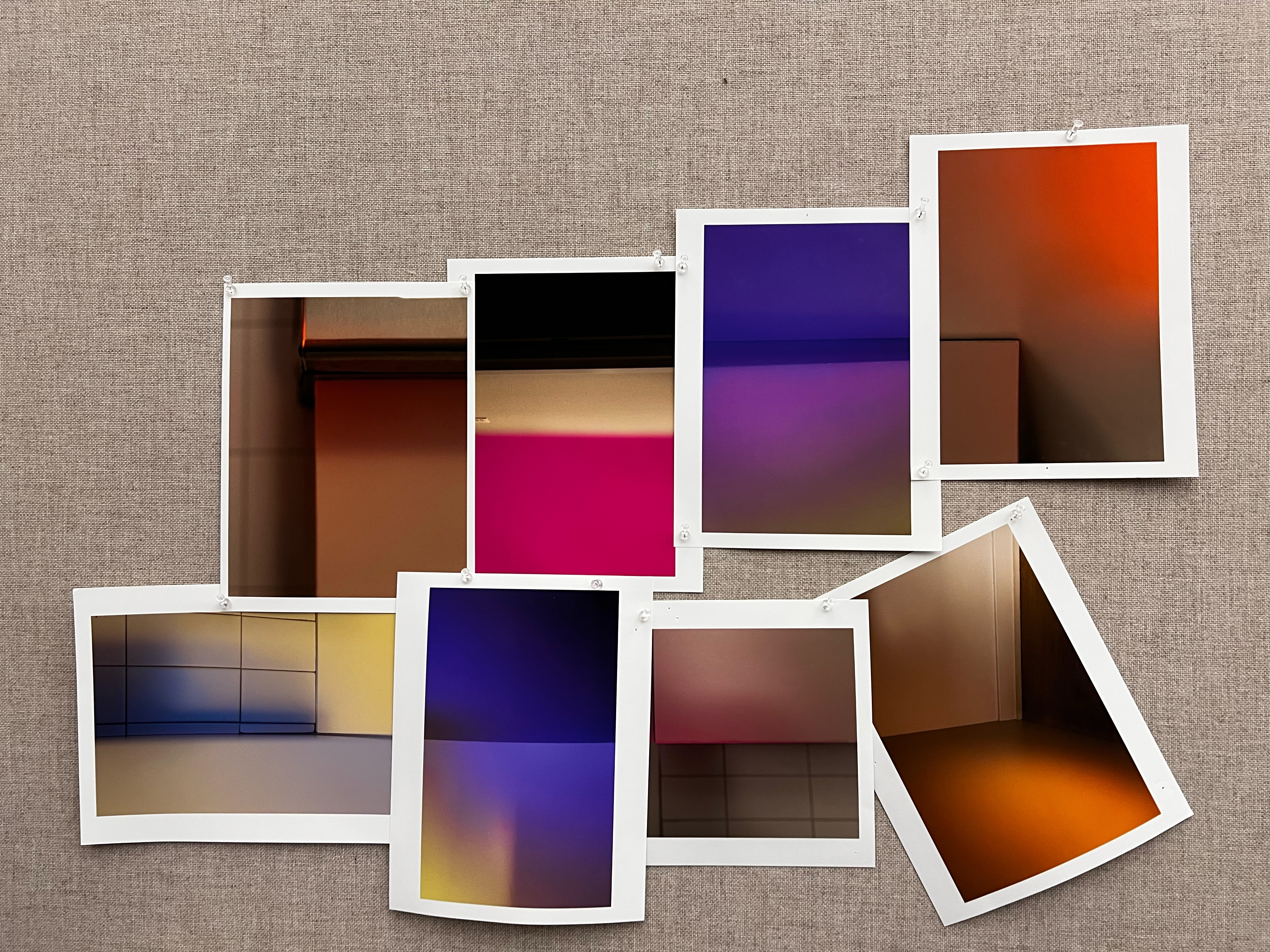 A collage of colorful abstract photographs arranged like pinned prints