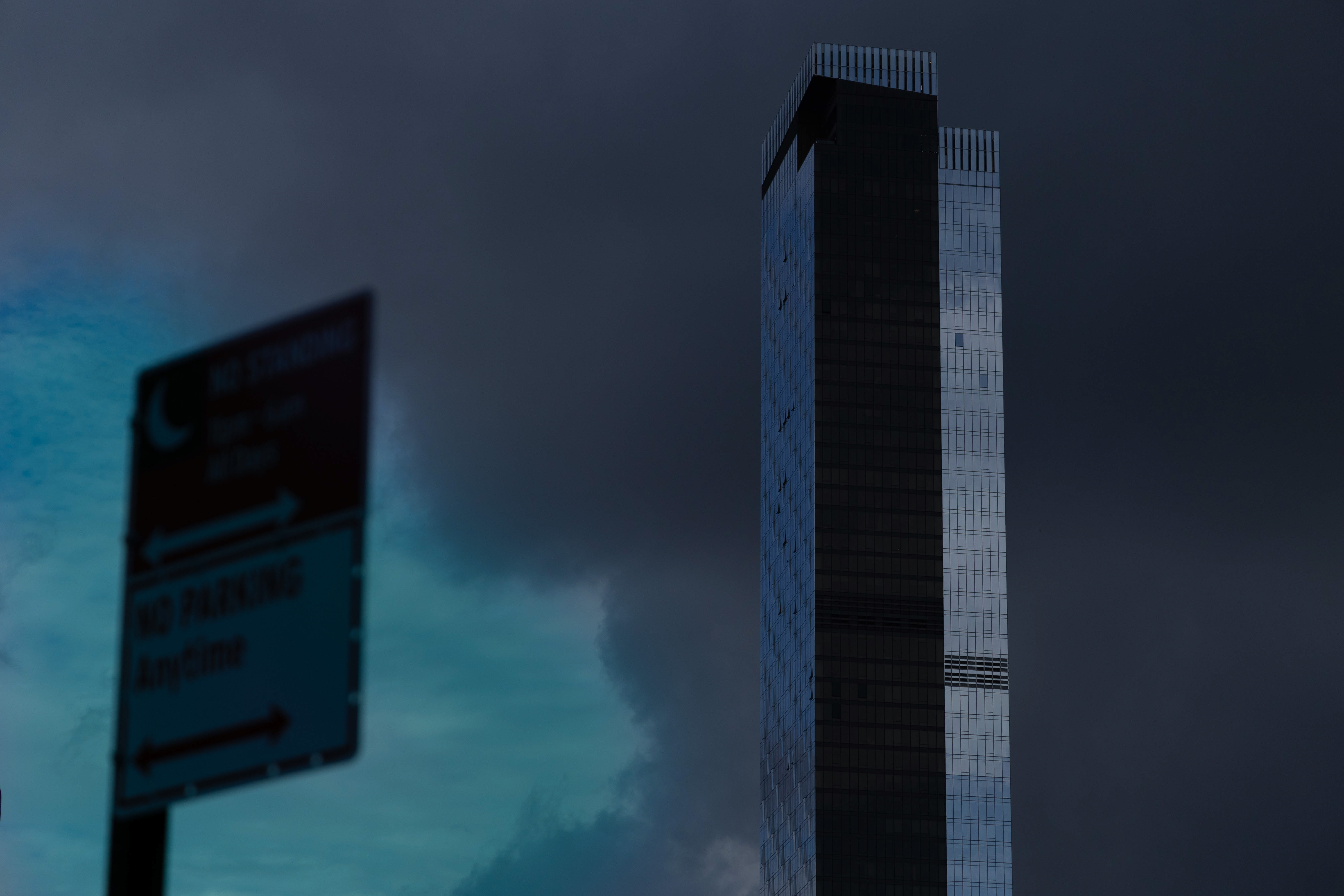 Dark window reflection with blue light and small red points